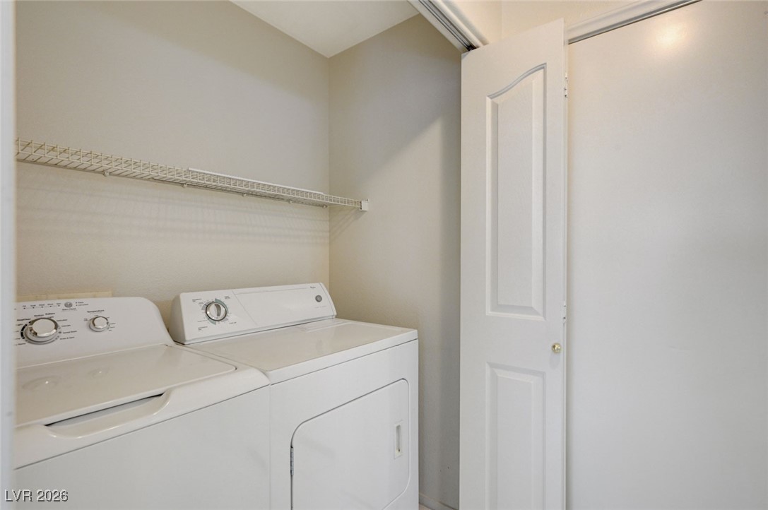 3901 Triora Street Las Vegas, NV 89129 - Photo 36 of 42 Laundry area with washing machine and dryer
