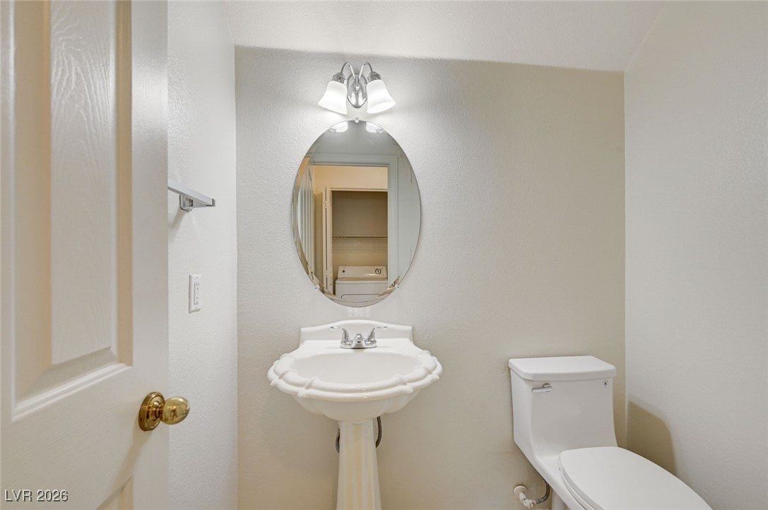 3901 Triora Street Las Vegas, NV 89129 - Photo 37 of 42 Half bathroom with toilet