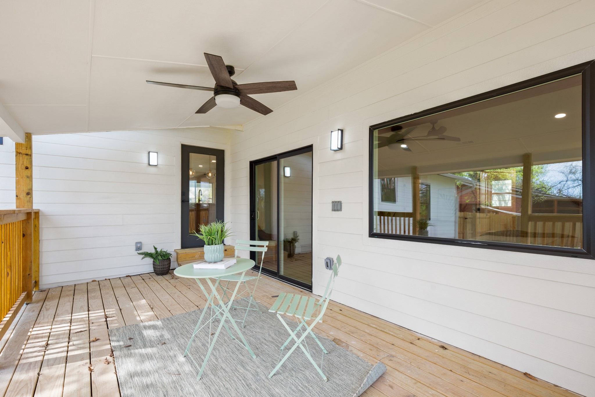 3308 Touchstone Street Austin, TX 78723 - Photo 33 of 38 Wooden deck with a ceiling fan