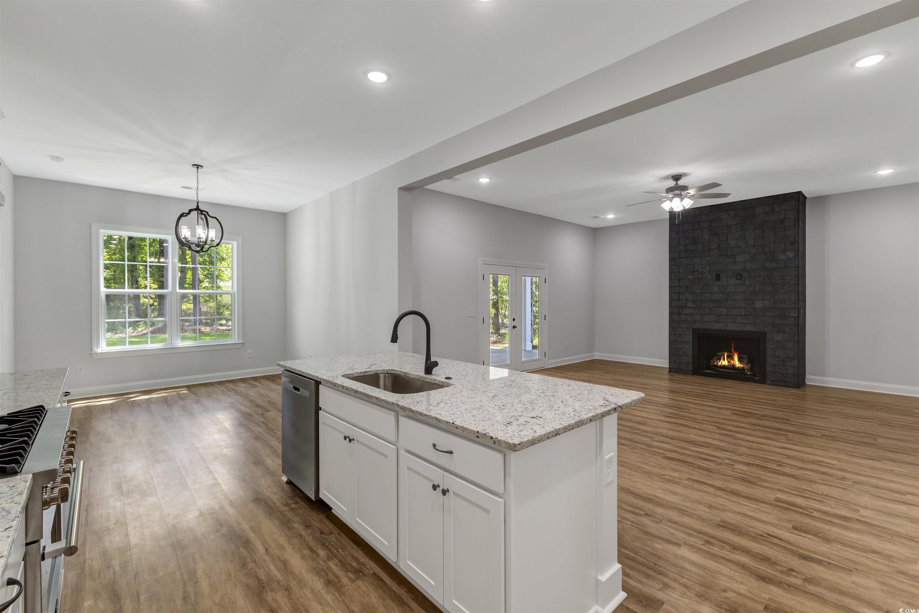 4121 Whatuthink Road Myrtle Beach, SC 29588 - Photo 28 of 28 Kitchen with a sink, open floor plan, and recessed lighting