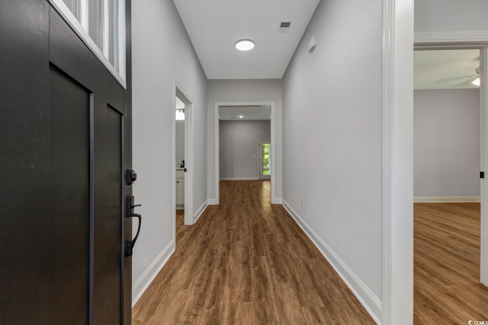 4121 Whatuthink Road Myrtle Beach, SC 29588 - Photo 6 of 28 Foyer/entryway with LVP finished floors and baseboards