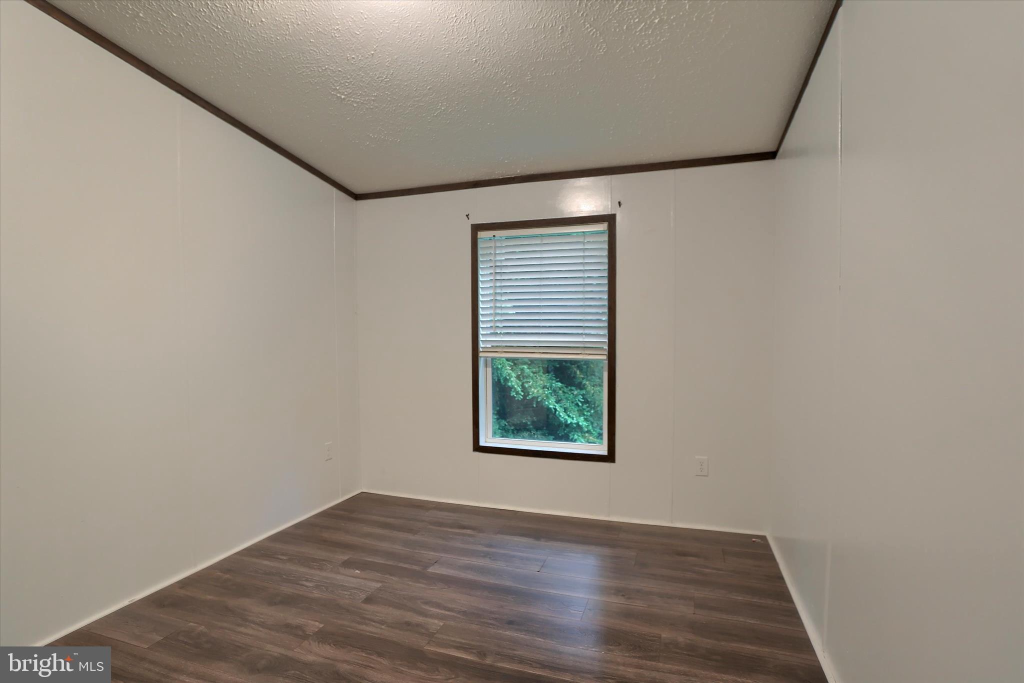 1148 Moulstown Road North Hanover, PA 17331 - Photo 21 of 29 an empty room with wooden floor and a window