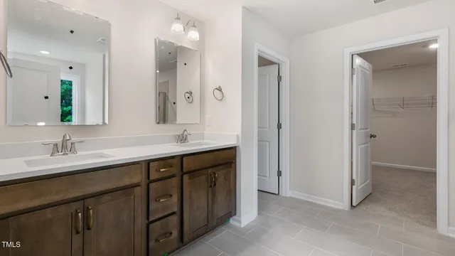 a bathroom with a bathtub and shower