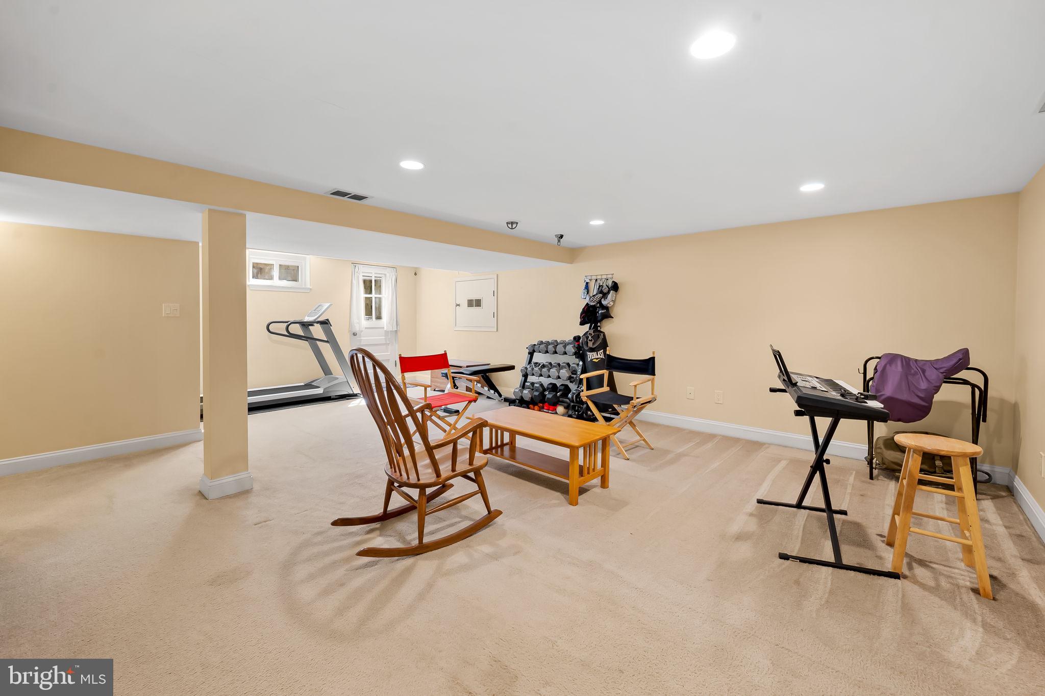 7919 Springway Road Towson, MD 21204 - Photo 32 of 46 a living room with furniture and white walls