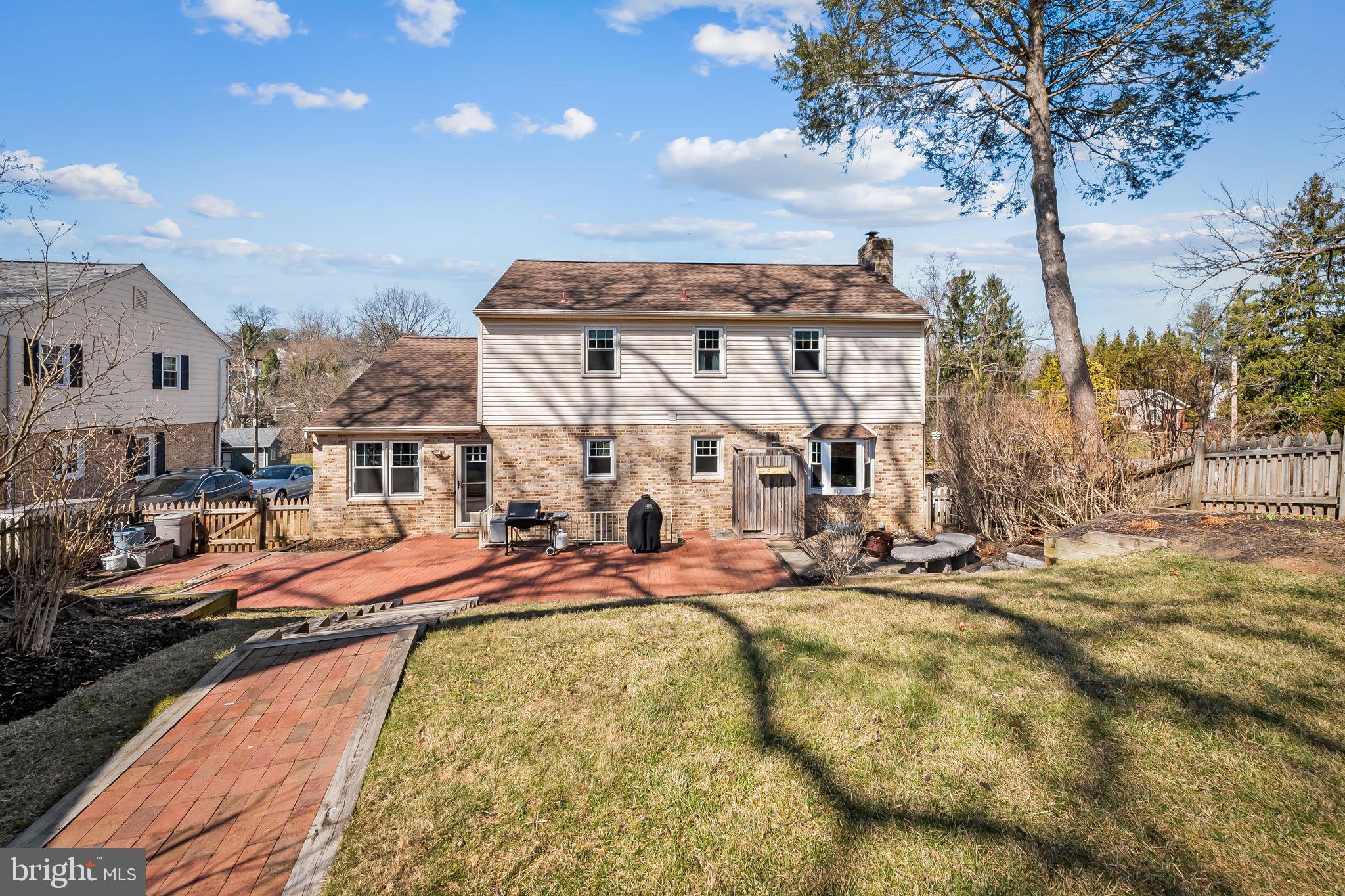 7919 Springway Road Towson, MD 21204 - Photo 38 of 46 a view of a swimming pool with outdoor seating