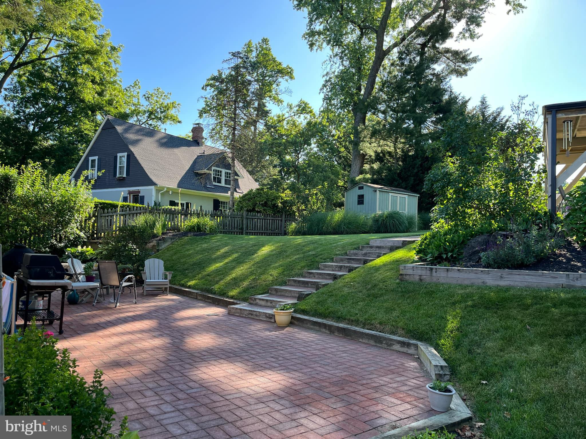 7919 Springway Road Towson, MD 21204 - Photo 40 of 46 a front view of house with yard and green space