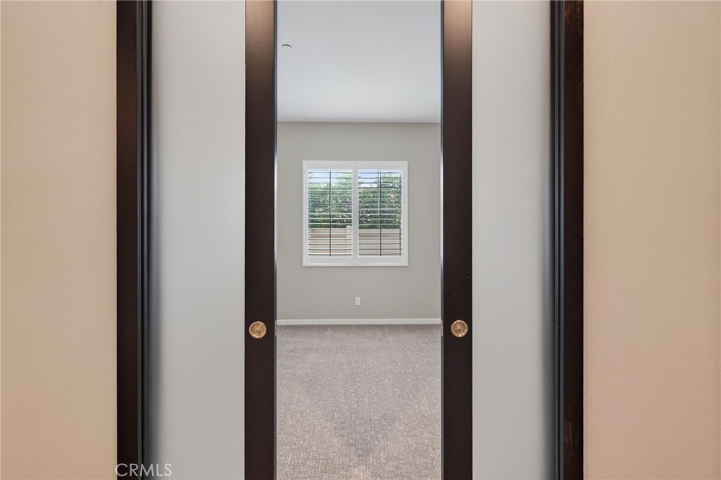 11137 Briar Rose Court Corona, CA 92883 - Photo 16 of 45 custom pocket doors into flex room
