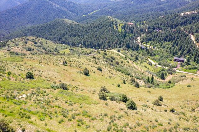 a view of a snow of the yard