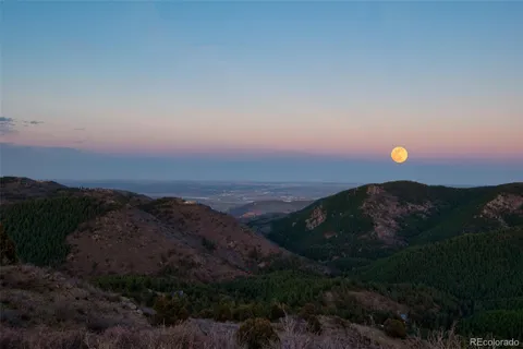 a view of sunset and mountains