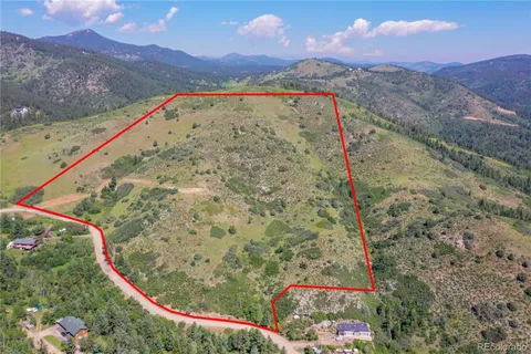 a view of a pathway with a mountain in the background