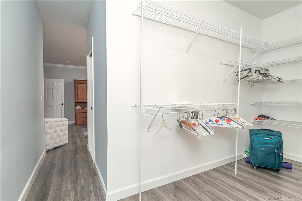 246 North Shore Road Killingly, CT 06241 - Photo 14 of 28 a storage room with wooden floor washer and dryer