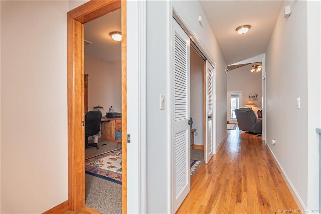 246 North Shore Road Killingly, CT 06241 - Photo 18 of 28 a view of a bedroom from a hallway