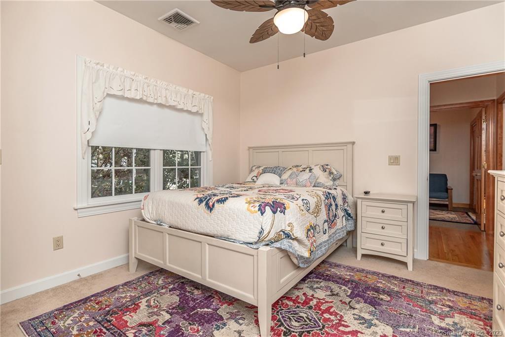 246 North Shore Road Killingly, CT 06241 - Photo 20 of 28 a large white bed in a white room