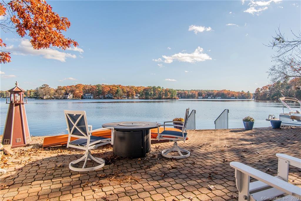 246 North Shore Road Killingly, CT 06241 - Photo 24 of 28 a outdoor sitting area with furniture and wooden floor