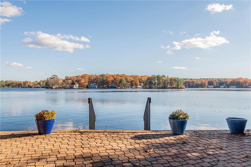 246 North Shore Road Killingly, CT 06241 - Photo 4 of 28 a view of a lake from a terrace