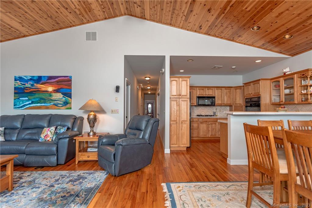 246 North Shore Road Killingly, CT 06241 - Photo 5 of 28 a living room with furniture and kitchen view