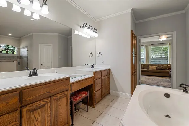 a bathroom with a sink a vanity and a mirror