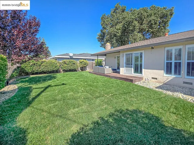 a view of a porch with a yard