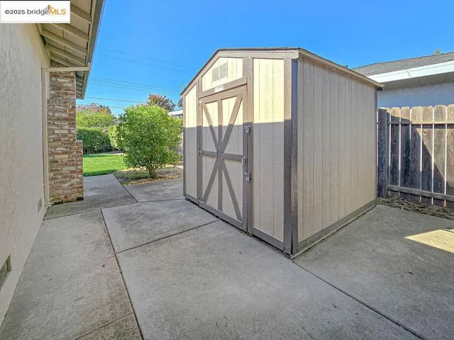 a view of a room with wooden walls