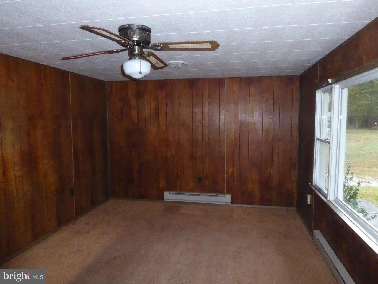21362 Nanticoke Road Tyaskin, MD 21865 - Photo 2 of 16 a view of an empty room with a window
