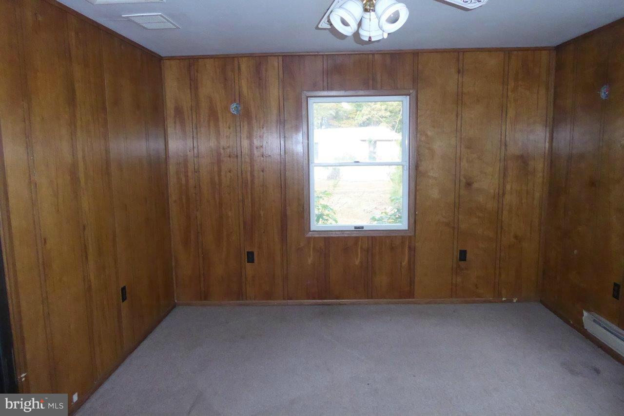 21362 Nanticoke Road Tyaskin, MD 21865 - Photo 14 of 16 an empty room with windows