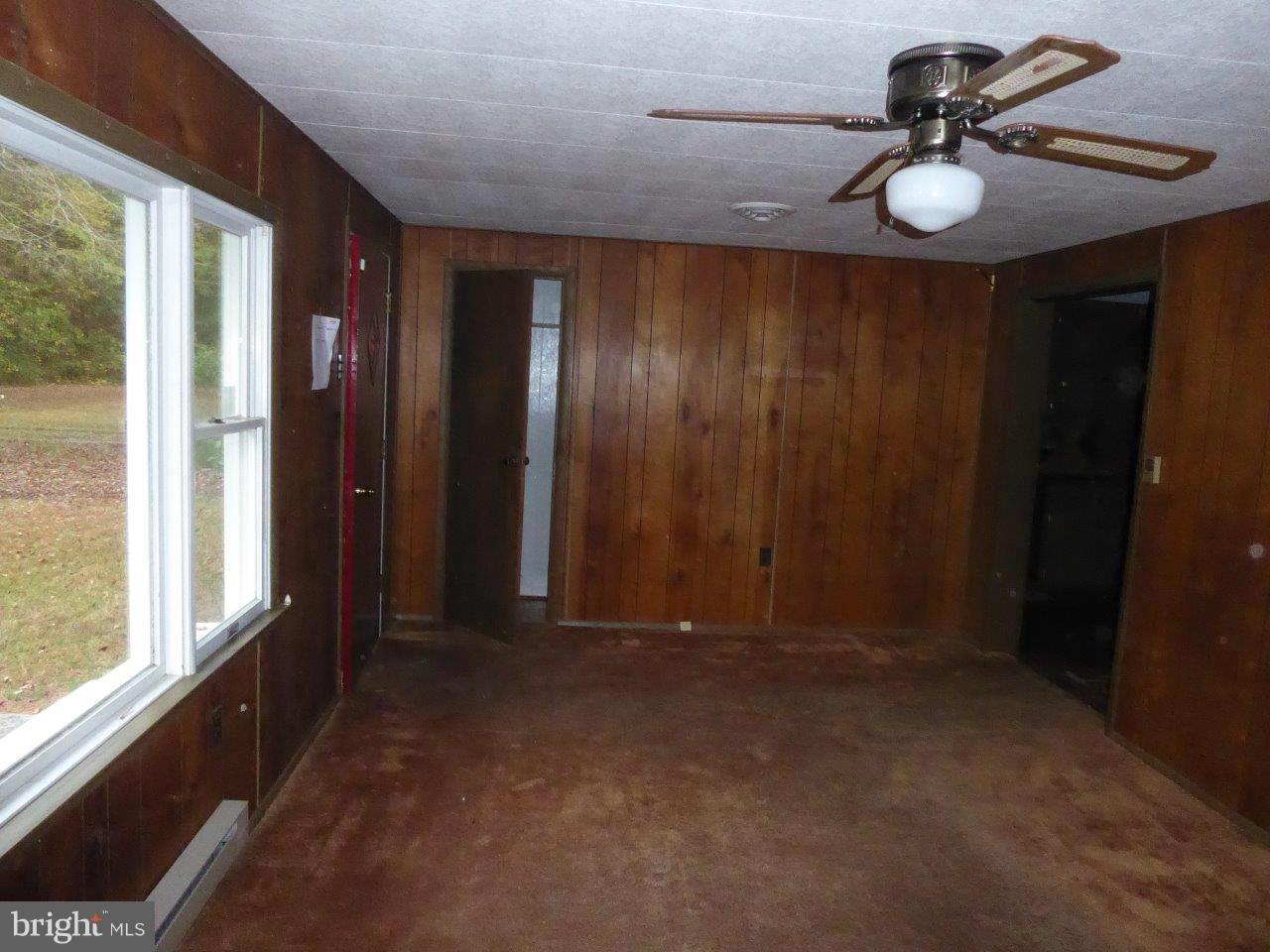 21362 Nanticoke Road Tyaskin, MD 21865 - Photo 3 of 16 a view of empty room with a window