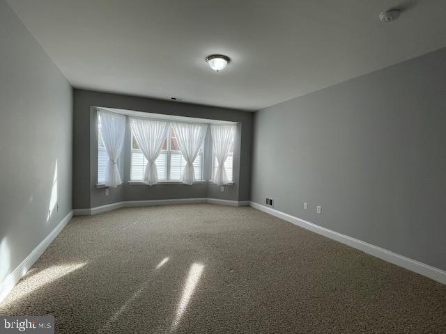9 Brattleboro Road Swedesboro, NJ 08085 - Photo 14 of 26 an empty room with windows