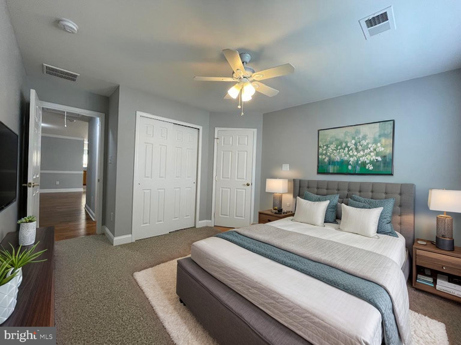 9 Brattleboro Road Swedesboro, NJ 08085 - Photo 18 of 26 a bedroom with a bed and a chandelier