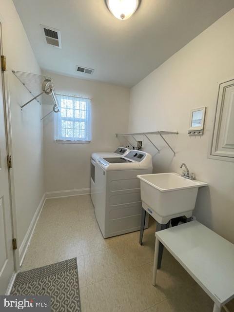9 Brattleboro Road Swedesboro, NJ 08085 - Photo 21 of 26 a bathroom with a sink toilet and shower