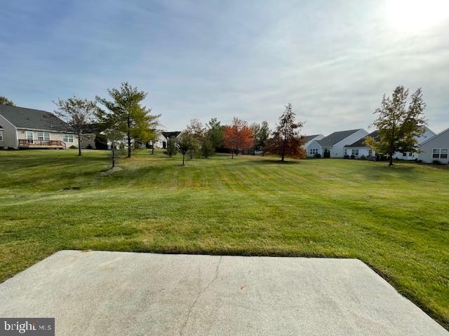 9 Brattleboro Road Swedesboro, NJ 08085 - Photo 25 of 26 a view of a garden with a building in the background