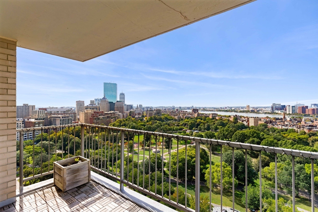 151 Tremont Street, Unit 23P Boston, MA 02111 - Photo 14 of 35 a view of a balcony with chair and city view
