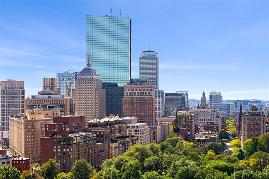 151 Tremont Street, Unit 23P Boston, MA 02111 - Photo 22 of 35 a view of a city with tall buildings