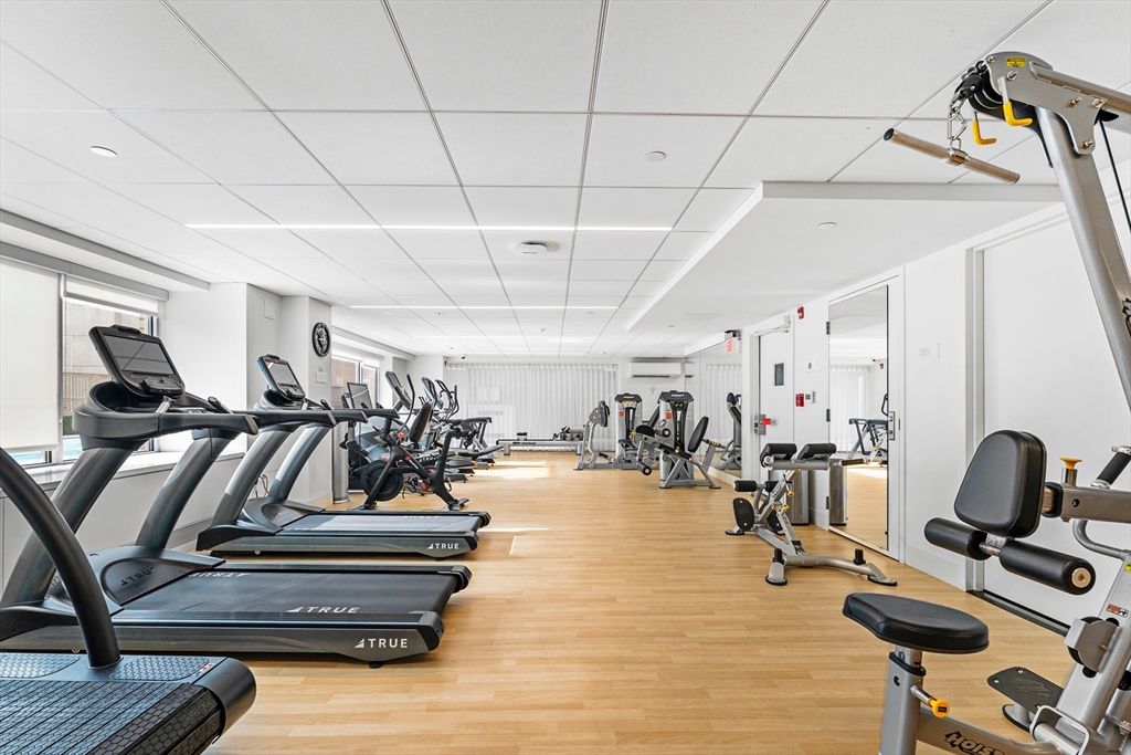 151 Tremont Street, Unit 23P Boston, MA 02111 - Photo 30 of 35 a view of a room with gym equipment