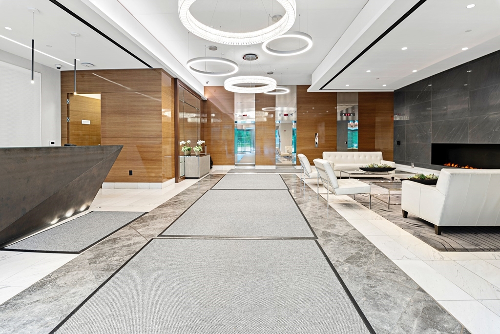 151 Tremont Street, Unit 23P Boston, MA 02111 - Photo 33 of 35 a lobby with furniture and window