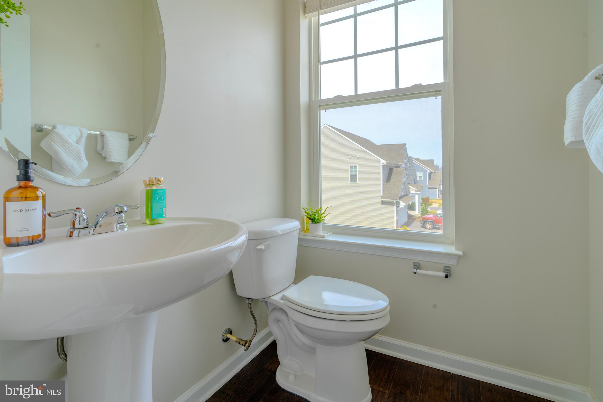 8515 Bald Eagle Lane Frederick, MD 21704 - Photo 19 of 34 a bathroom with a sink a toilet and shower