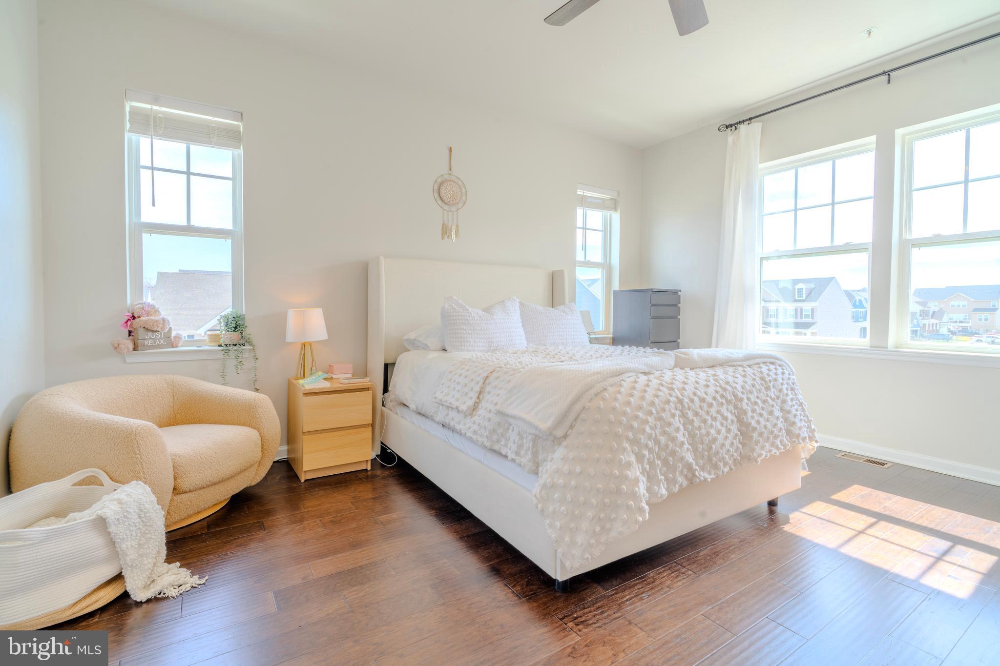 8515 Bald Eagle Lane Frederick, MD 21704 - Photo 21 of 34 a bedroom with bed and a large window