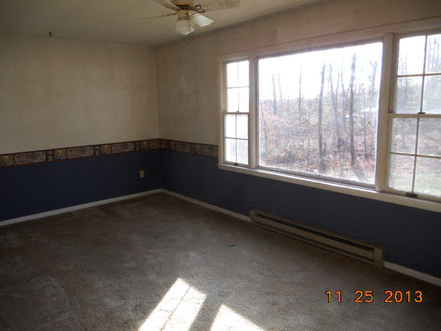193 Holly Ridge Road Mount Jackson, VA 22842 - Photo 2 of 12 an empty room with a window