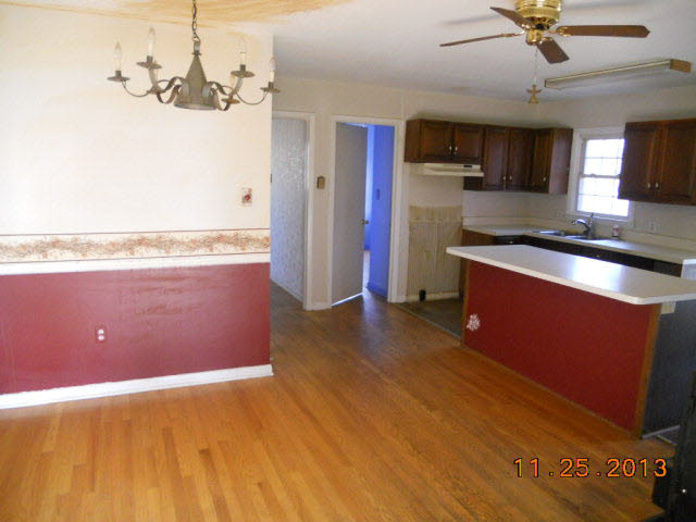 193 Holly Ridge Road Mount Jackson, VA 22842 - Photo 4 of 12 a kitchen with stainless steel appliances granite countertop a stove a sink and a refrigerator