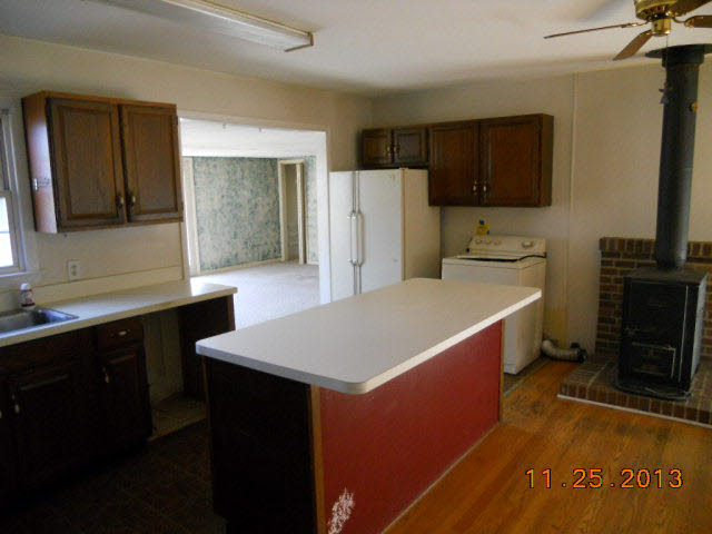 193 Holly Ridge Road Mount Jackson, VA 22842 - Photo 5 of 12 a kitchen with stainless steel appliances a refrigerator sink and microwave