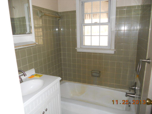 193 Holly Ridge Road Mount Jackson, VA 22842 - Photo 10 of 12 a bathroom with a tub a sink and a shower
