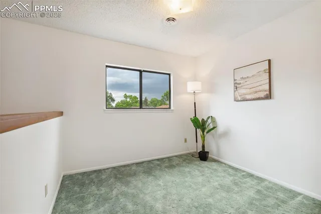 a view of livingroom with a window