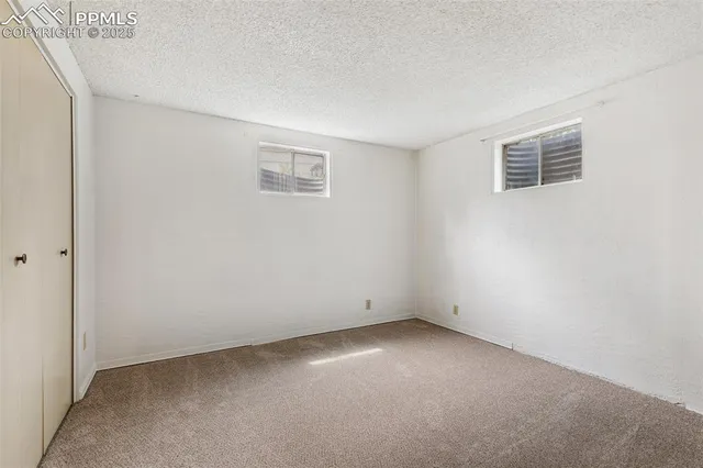 an empty room with closet