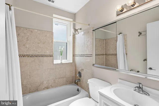 a bathroom with a sink and a bathtub