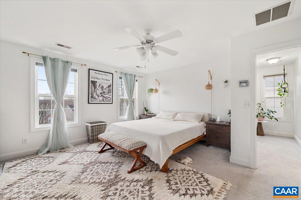 1375 Amber Ridge Road Charlottesville, VA 22901 - Photo 32 of 48 a bedroom with a bed and wooden floor