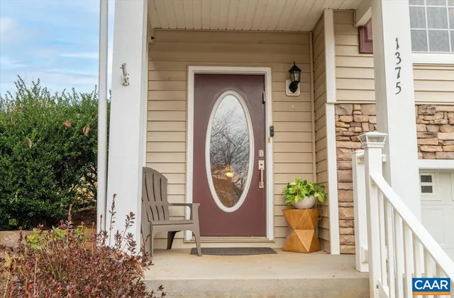 a view of entryway with wooden floor