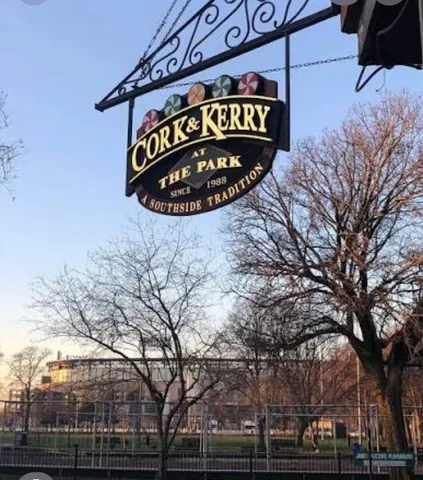 a front view of a house with a garden and fountain