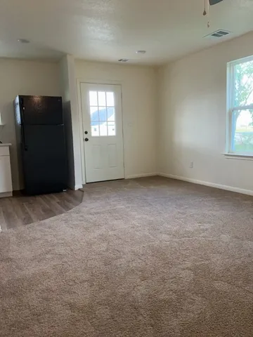 an empty room with windows