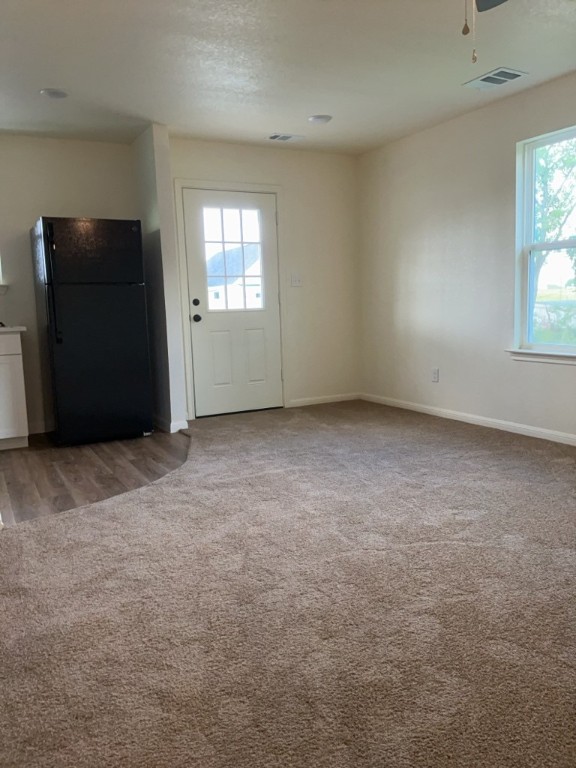2002 West 2nd Street, Unit 1002 Taylor, TX 76574 - Photo 15 of 15 an empty room with windows