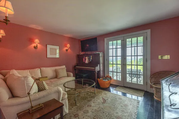 a living room with furniture and a window