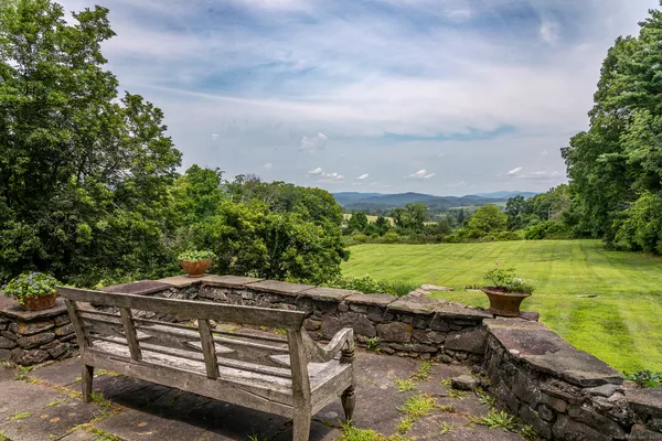 a view of a lake with a yard